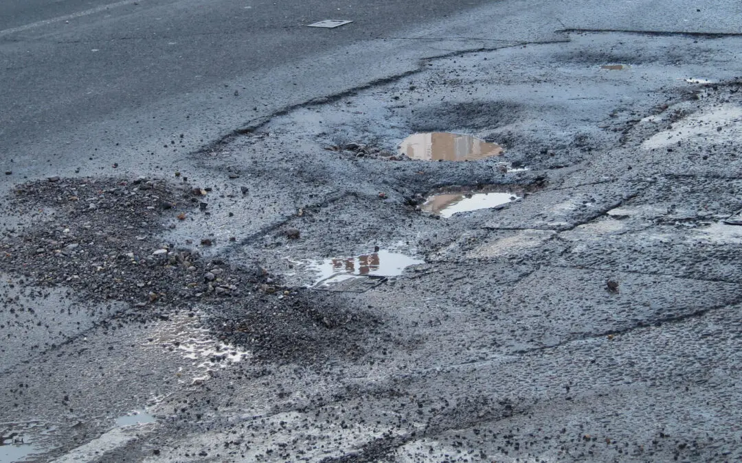 How Potholes Form: Explaining It to Your Clients in Fun Terms